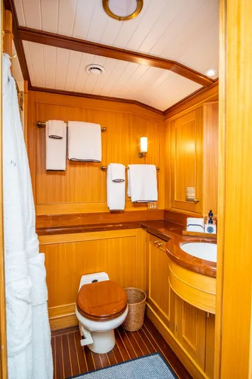 Fortuna Yacht Photos Pics Luxurious wooden bathroom interior on 1999 Palmer Johnson motor yacht.