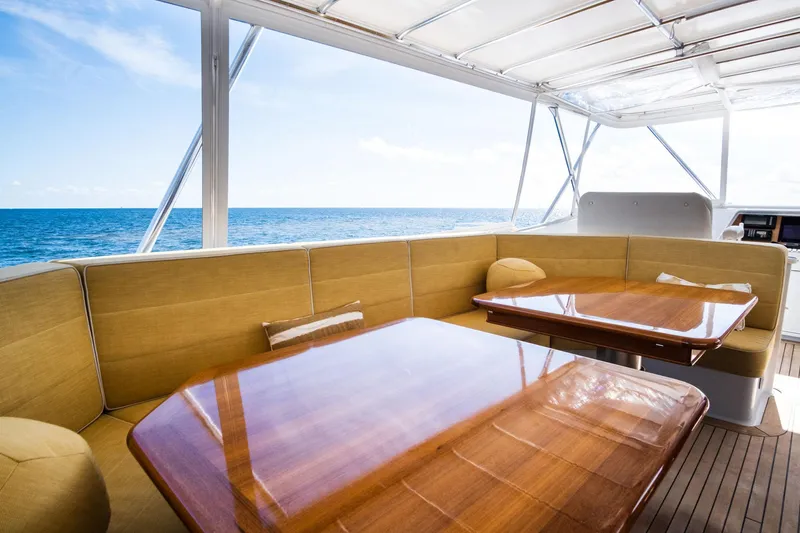 Fortuna Yacht Photos Pics Luxurious Palmer Johnson 1999 motor yacht deck with elegant seating and ocean view.