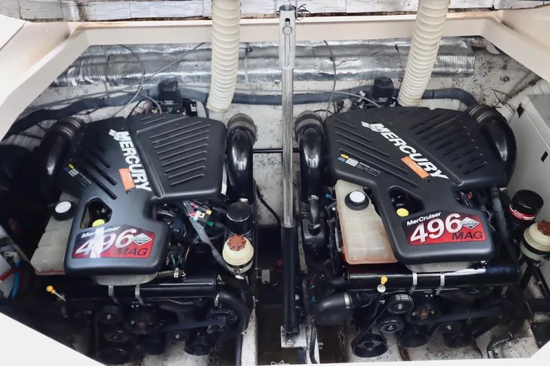 Pura Vida Yacht Photos Pics Twin MerCruiser 496 MAG engines in a 2006 Rinker 360 Express Cruiser.