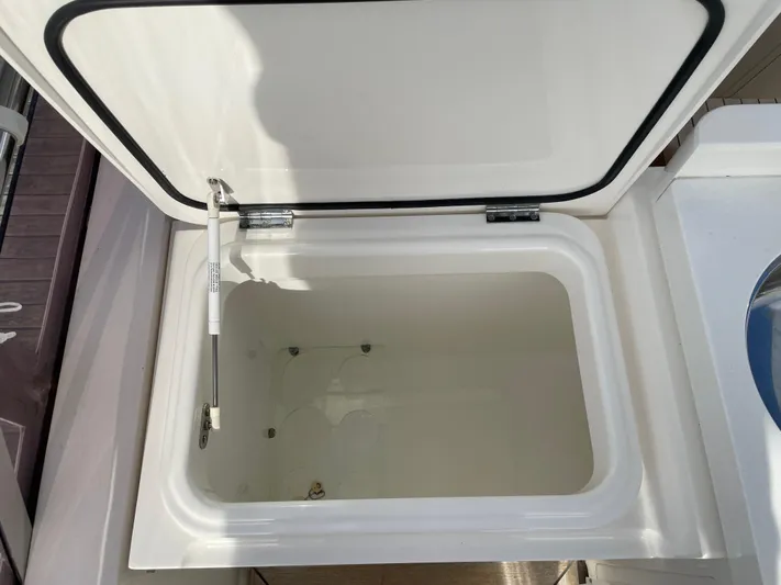  Yacht Photos Pics Open storage compartment on a 2012 Princess 72 Motor Yacht.