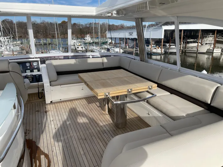  Yacht Photos Pics Luxurious seating area on 2012 Princess 72 Motor Yacht with marina view.