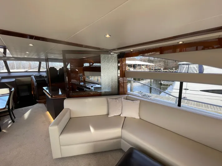  Yacht Photos Pics Luxurious interior of 2012 Princess 72 Motor Yacht with elegant seating and large windows.