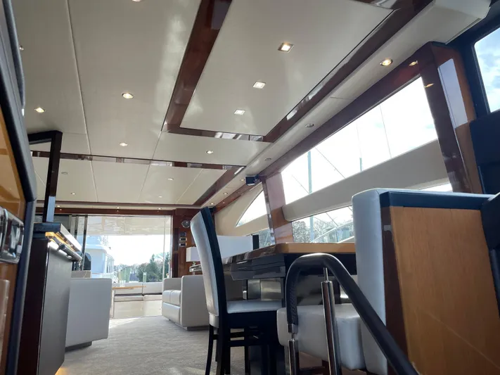  Yacht Photos Pics Luxurious interior of a 2012 Princess 72 Motor Yacht with modern furnishings and ample natural light.