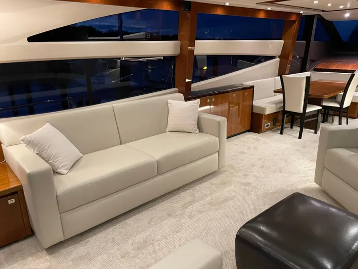  Yacht Photos Pics Luxurious interior of 2012 Princess 72 Motor Yacht with elegant seating and dining area.