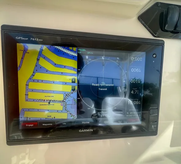  Yacht Photos Pics Garmin GPS display on 2016 Sailfish 320CC boat, showing navigation map and radar.