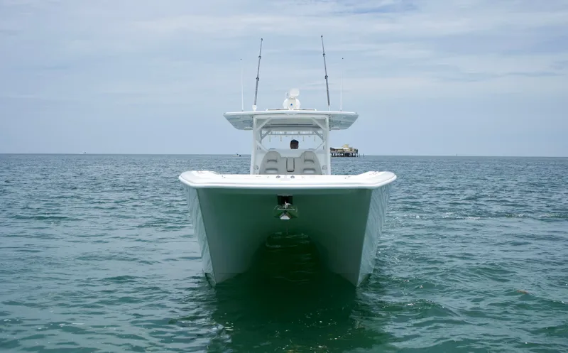  Yacht Photos Pics Front view of a 2022 Freeman 42 LR boat on open water.