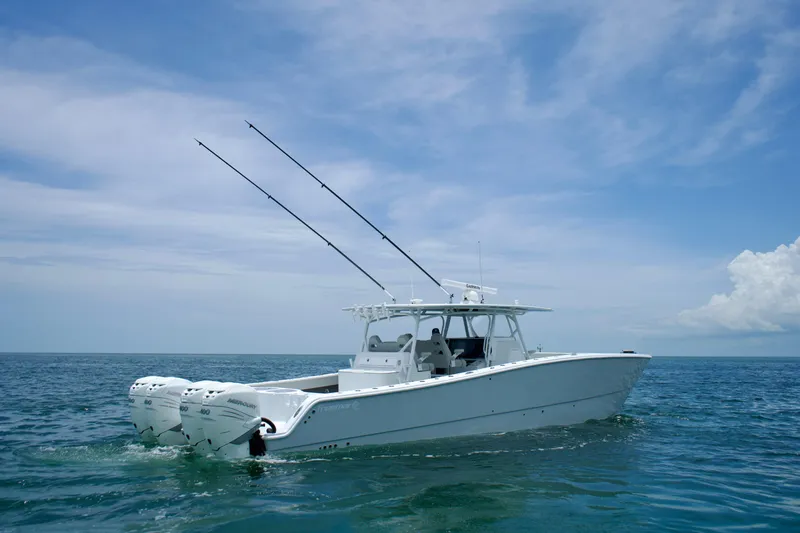  Yacht Photos Pics 2022 Freeman 42 LR boat on open sea under clear blue sky.