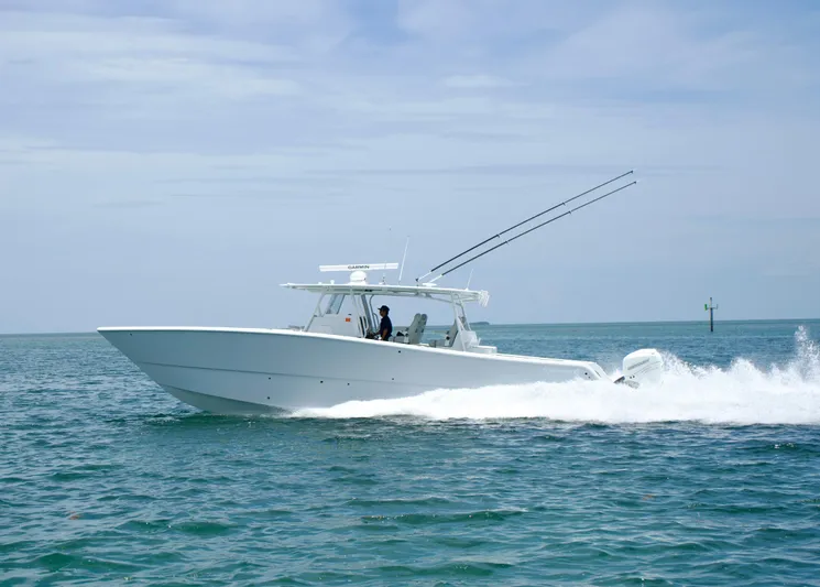  Yacht Photos Pics 2022 Freeman 42 LR boat cruising on open water under clear skies.