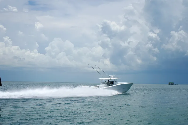  Yacht Photos Pics Freeman 42 LR boat cruising on open water under cloudy sky, 2022 model.