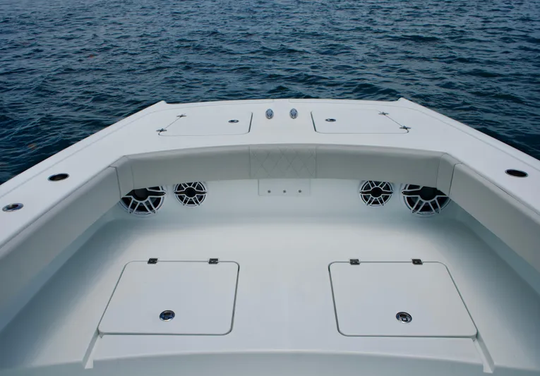  Yacht Photos Pics Freeman 42 LR 2022 boat deck with storage compartments and ocean view.