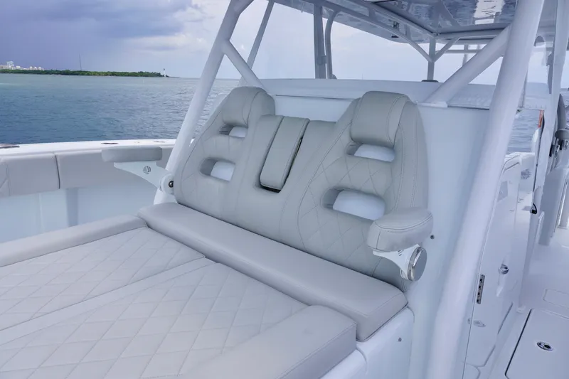  Yacht Photos Pics Luxurious seating on 2022 Freeman 42 LR boat with ocean backdrop.