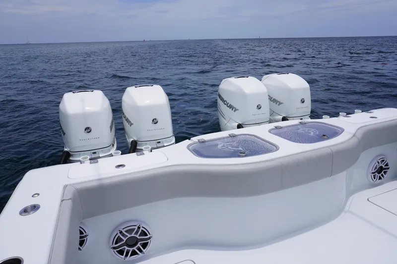  Yacht Photos Pics Freeman 42 LR boat with four Mercury outboard engines on open water, 2022 model.