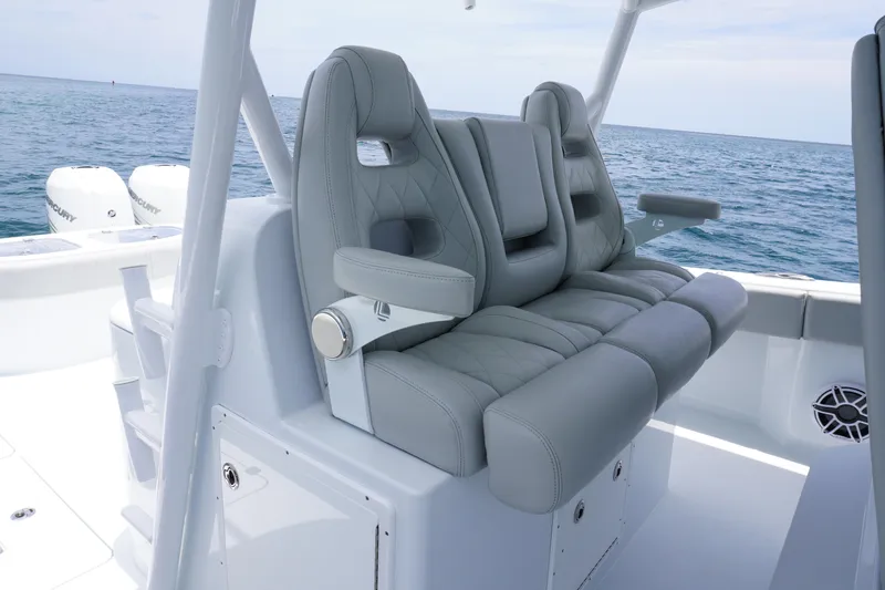  Yacht Photos Pics Luxury seating on 2022 Freeman 42 LR boat with ocean backdrop.