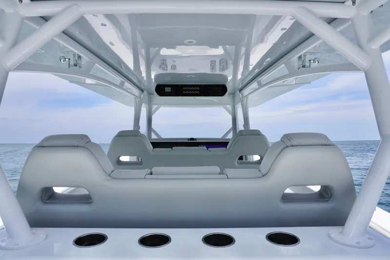  Yacht Photos Pics 2022 Freeman 42 LR boat interior with sleek seating and ocean view.