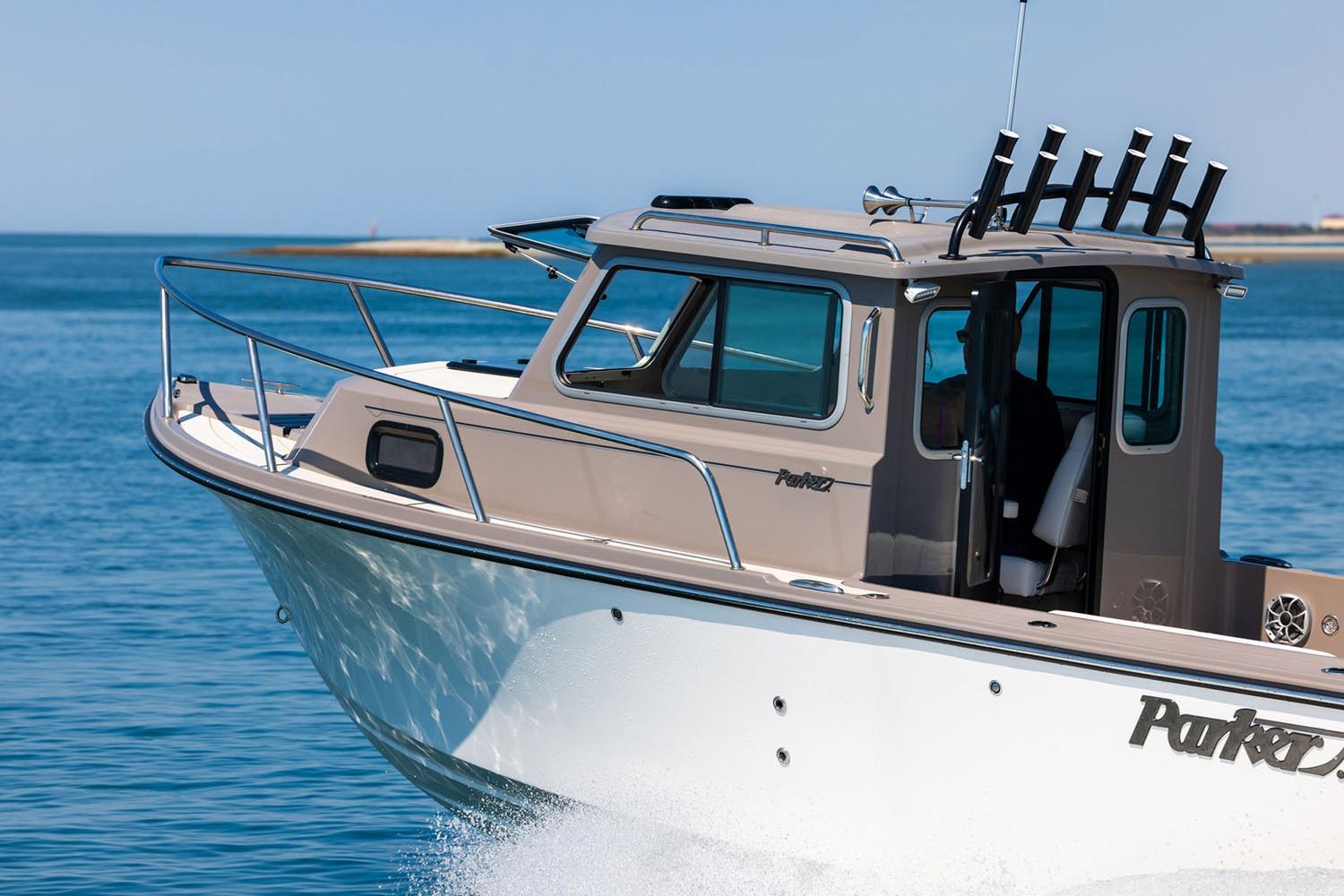 Manufacturer Provided Image: 2026 Parker 217 Explorer boat cruising on clear blue water.