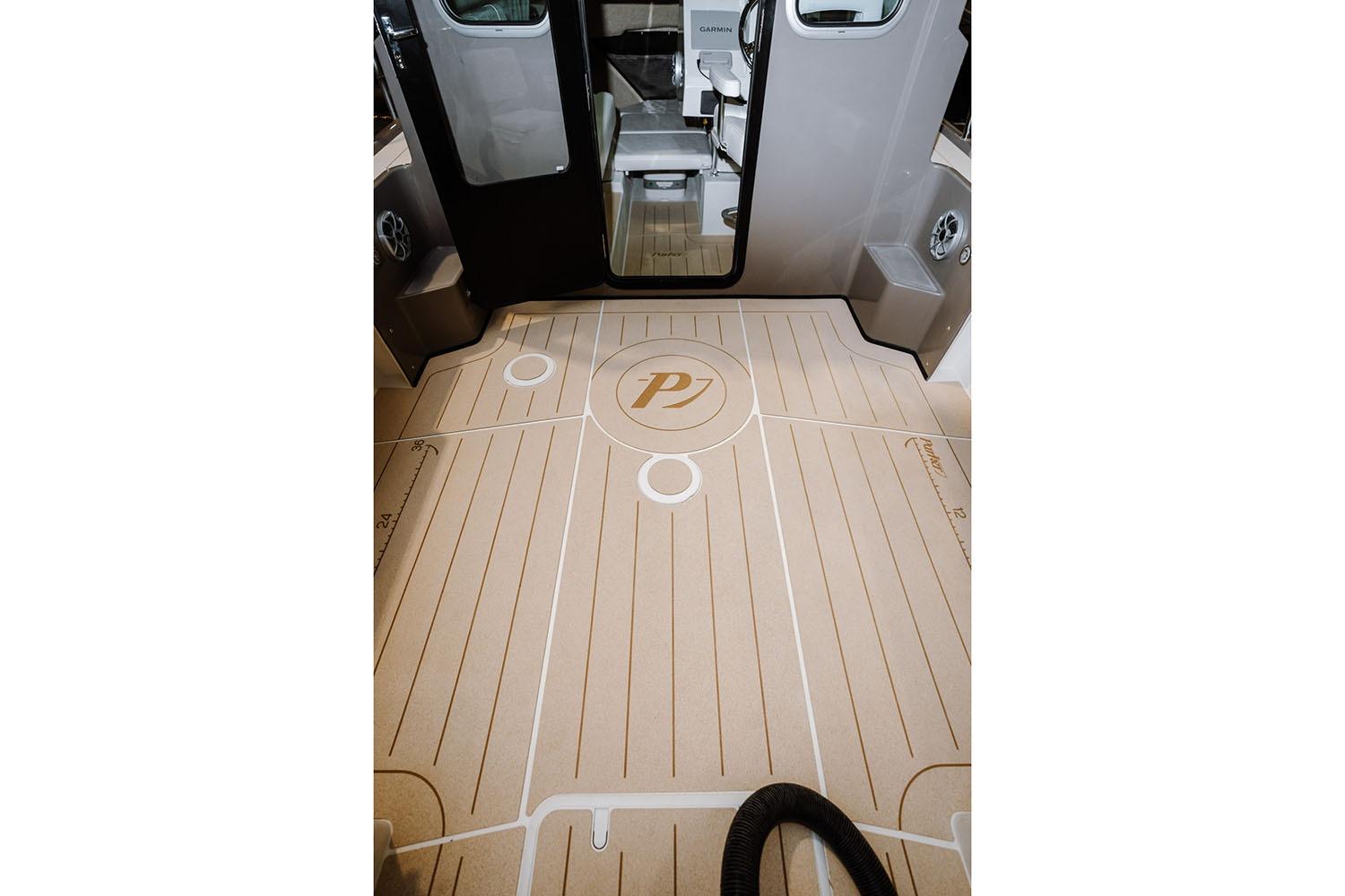 Manufacturer Provided Image: Interior view of 2026 Parker 217 Explorer boat with custom flooring design.