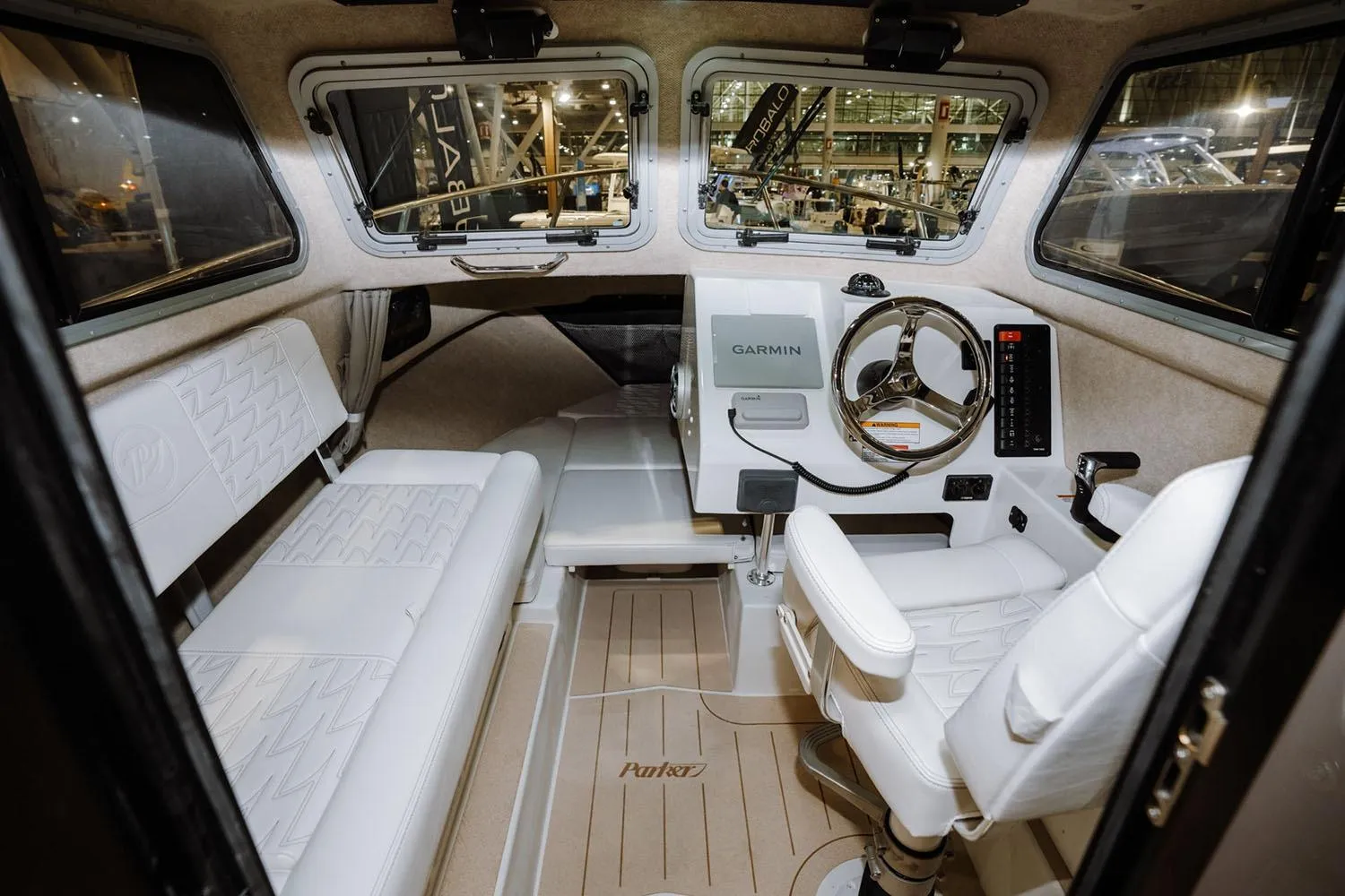 Manufacturer Provided Image: Interior of 2026 Parker 217 Explorer boat with modern helm and seating.