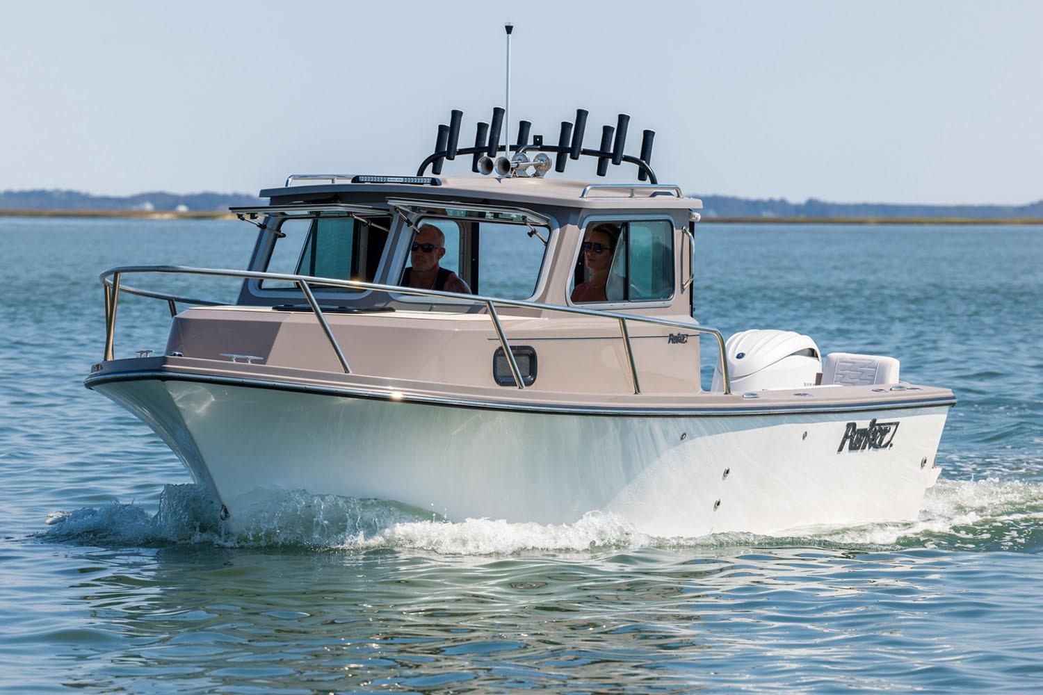 Manufacturer Provided Image: 2026 Parker 217 Explorer boat cruising on calm waters.