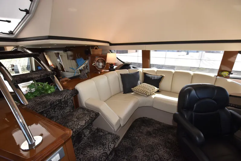 Seawood Yacht Photos Pics Luxurious interior of 2007 Carver 52 Voyager yacht with plush seating and elegant decor.