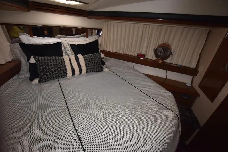 Seawood Yacht Photos Pics Luxurious bedroom interior of 2007 Carver 52 Voyager yacht with elegant bedding.