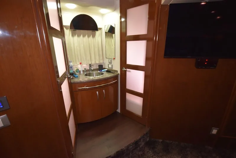 Seawood Yacht Photos Pics Interior of 2007 Carver 52 Voyager yacht with sink and TV.
