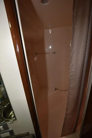 Seawood Yacht Photos Pics Shower area in 2007 Carver 52 Voyager yacht with curtain and towel rail.