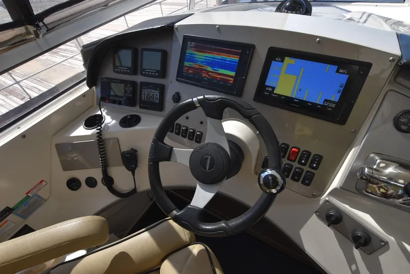 Seawood Yacht Photos Pics 2007 Carver 52 Voyager helm with advanced navigation and control systems.
