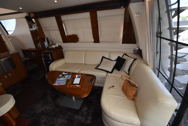 Seawood Yacht Photos Pics Luxurious interior of 2007 Carver 52 Voyager yacht with white leather seating.