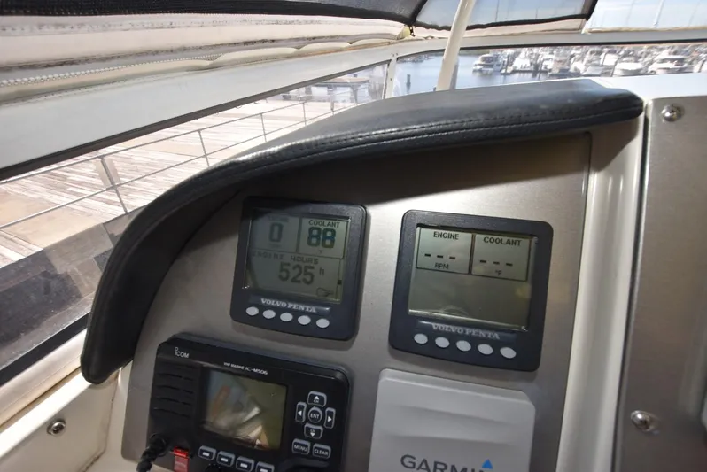 Seawood Yacht Photos Pics Dashboard of 2007 Carver 52 Voyager with navigation and engine displays.