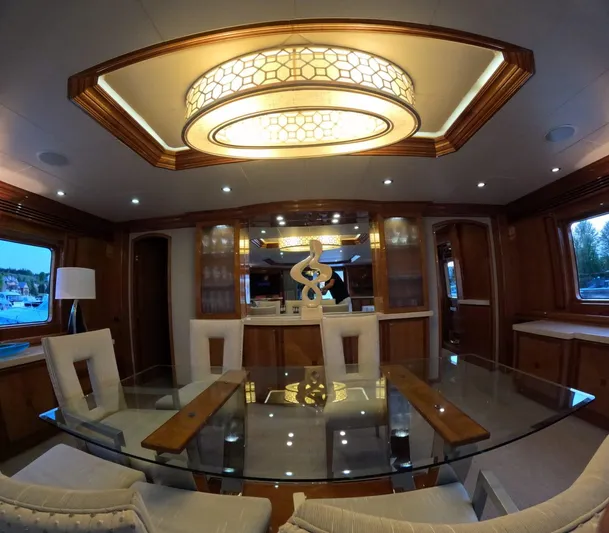Sterling V Yacht Photos Pics Luxurious interior of 2007 Hargrave 93' yacht with elegant dining area and modern lighting.