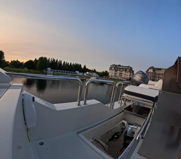 Sterling V Yacht Photos Pics Luxury Hargrave yacht docked by scenic waterfront at sunset, 2007 model.