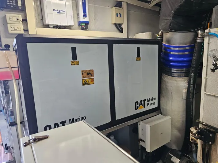 Sterling V Yacht Photos Pics CAT Marine Power equipment in a 2007 Hargrave 93' yacht engine room.