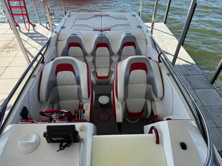  Yacht Photos Pics Interior of a 2008 Fountain 38 Lightning boat with red and white seating.