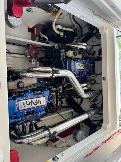  Yacht Photos Pics Engine compartment of a 2008 Fountain 38 Lightning boat, showcasing dual high-performance engines.