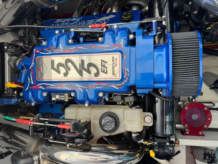  Yacht Photos Pics 2008 Fountain 38 Lightning engine, Mercury 525 EFI, vibrant blue detailing.