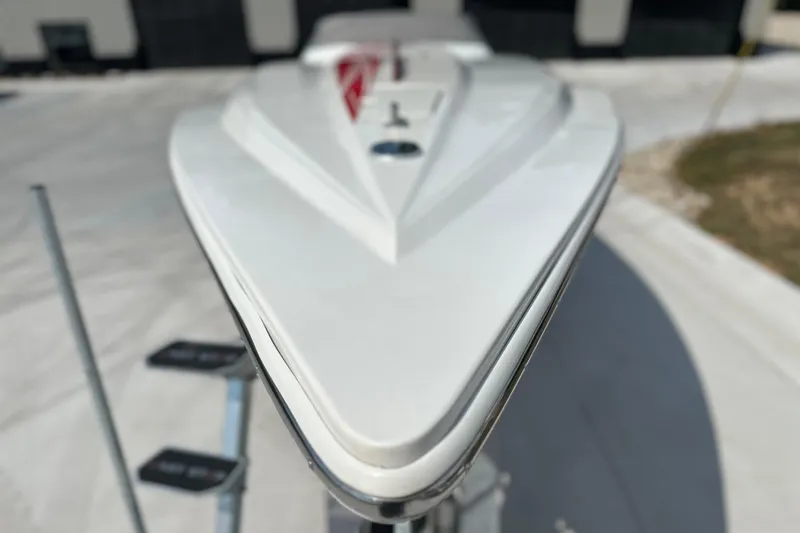  Yacht Photos Pics 2008 Fountain 38 Lightning boat bow, sleek design, parked on trailer.