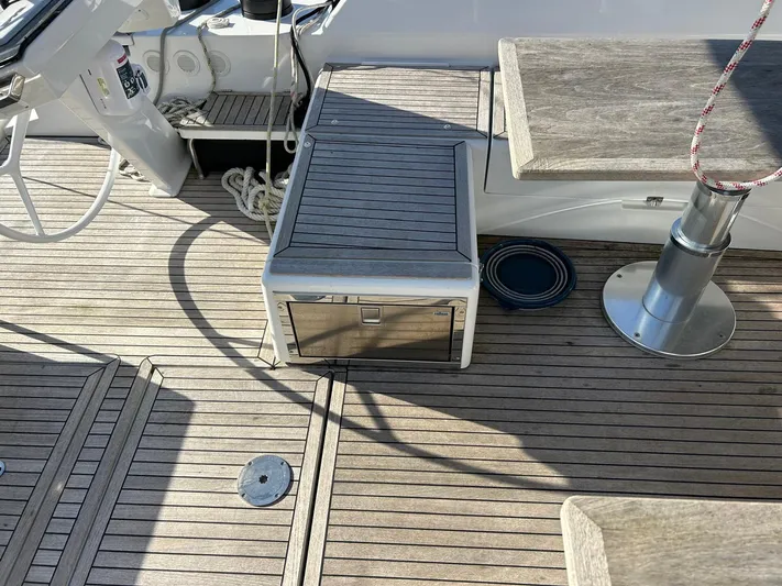  Yacht Photos Pics Teak deck of 2022 Hanse 510 yacht with seating and storage.