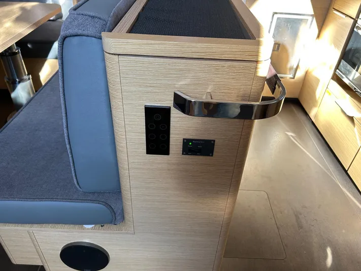  Yacht Photos Pics Interior of 2022 Hanse 510 yacht with modern seating and control panel.