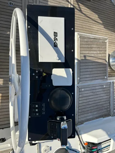  Yacht Photos Pics Steering wheel and control panel of 2022 Hanse 510 yacht with B&G navigation system.