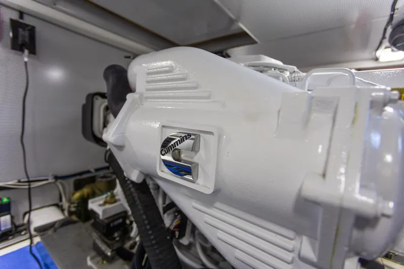 Boondoggle Yacht Photos Pics Engine room of 2021 North Pacific 49 Pilothouse featuring Cummins engine.