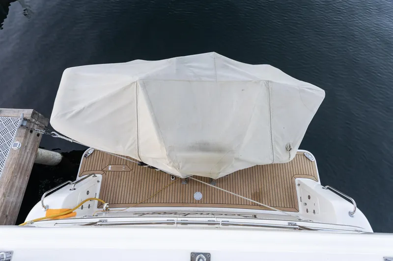 Boondoggle Yacht Photos Pics Overhead view of 2021 North Pacific 49 Pilothouse yacht docked with covered deck.