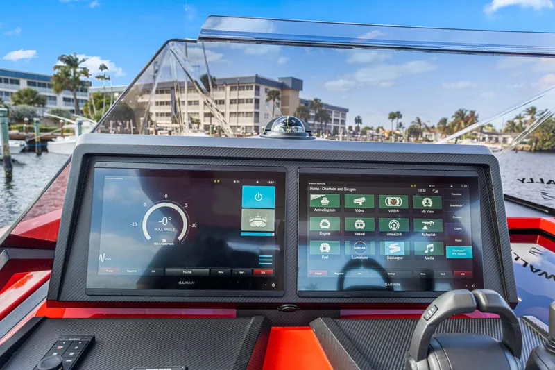 Corso Red Yacht Photos Pics Helm of 2021 Wally 48 yacht with advanced touchscreen navigation displays.