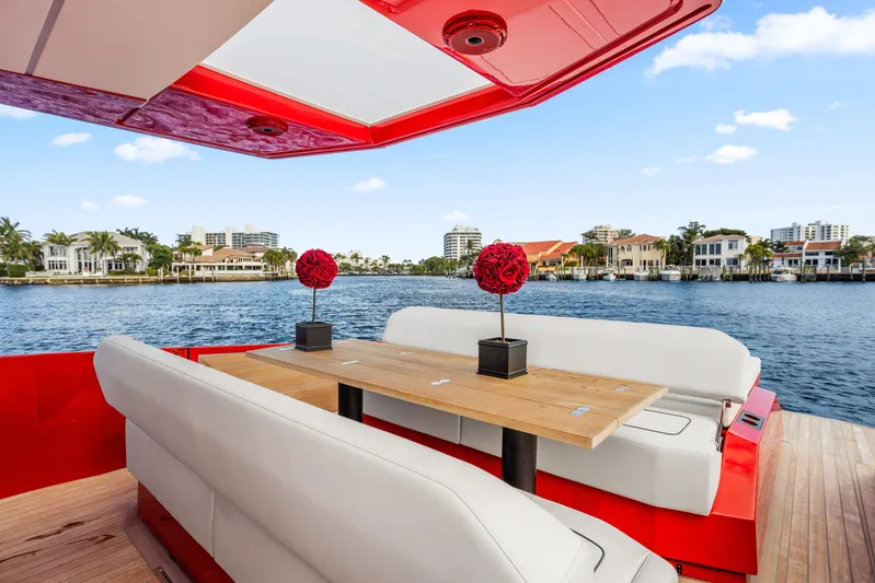 Corso Red Yacht Photos Pics Luxury yacht Wally 48 interior with elegant seating and waterfront view, 2021 model.