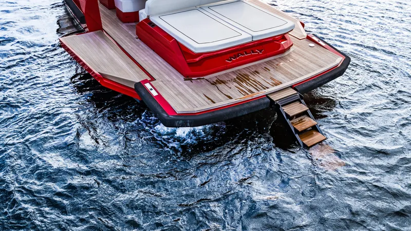 Corso Red Yacht Photos Pics Sleek 2021 Wally 48 yacht with wooden deck and water access ladder.
