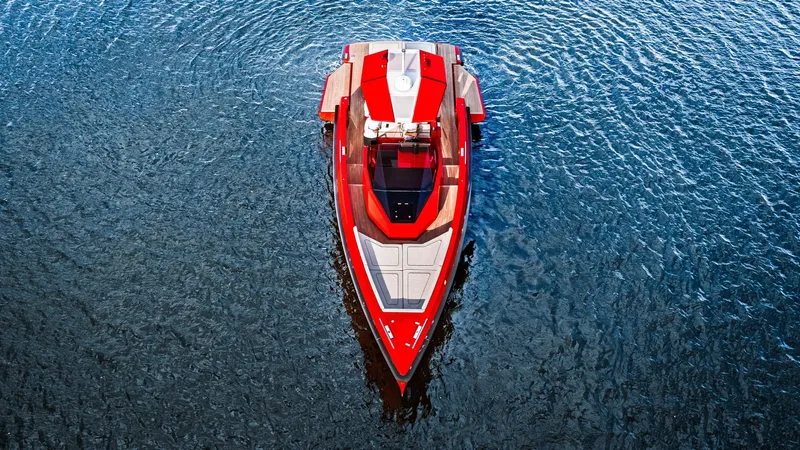 Corso Red Yacht Photos Pics Red Wally 48 yacht on blue water, aerial view, 2021 model.