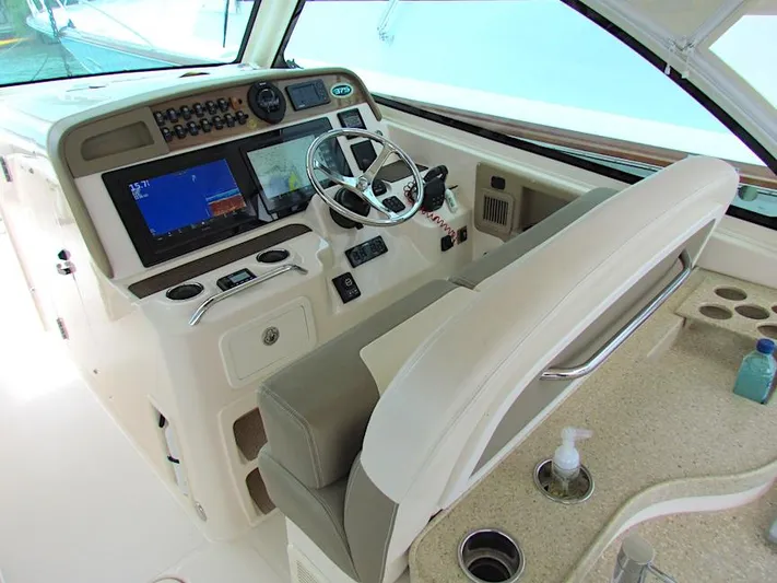  Yacht Photos Pics 2014 Grady-White Freedom 375 helm with modern controls and navigation systems.