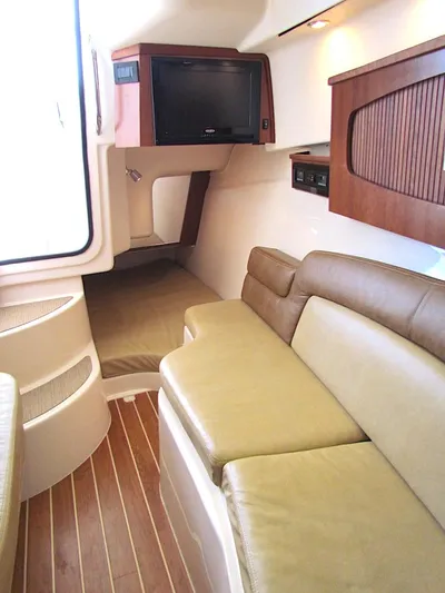  Yacht Photos Pics 2014 Grady-White Freedom 375 interior with leather seating and wood accents.