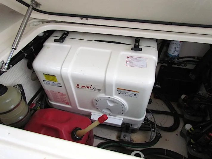  Yacht Photos Pics Engine compartment of 2014 Grady-White Freedom 375 with generator and fuel container.