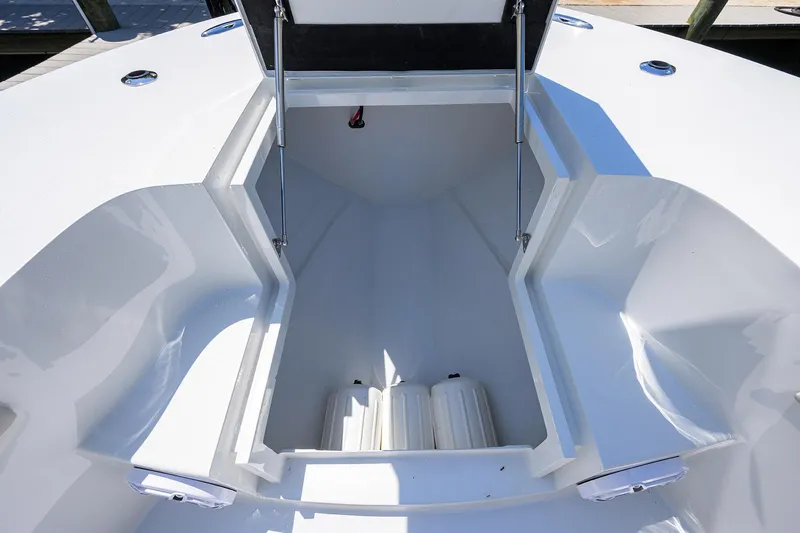  Yacht Photos Pics 2024 Conch 25 boat interior storage compartment, open and spacious design.