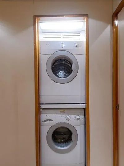  Yacht Photos Pics Stacked washer and dryer in 2007 Hatteras 68 Convertible yacht.